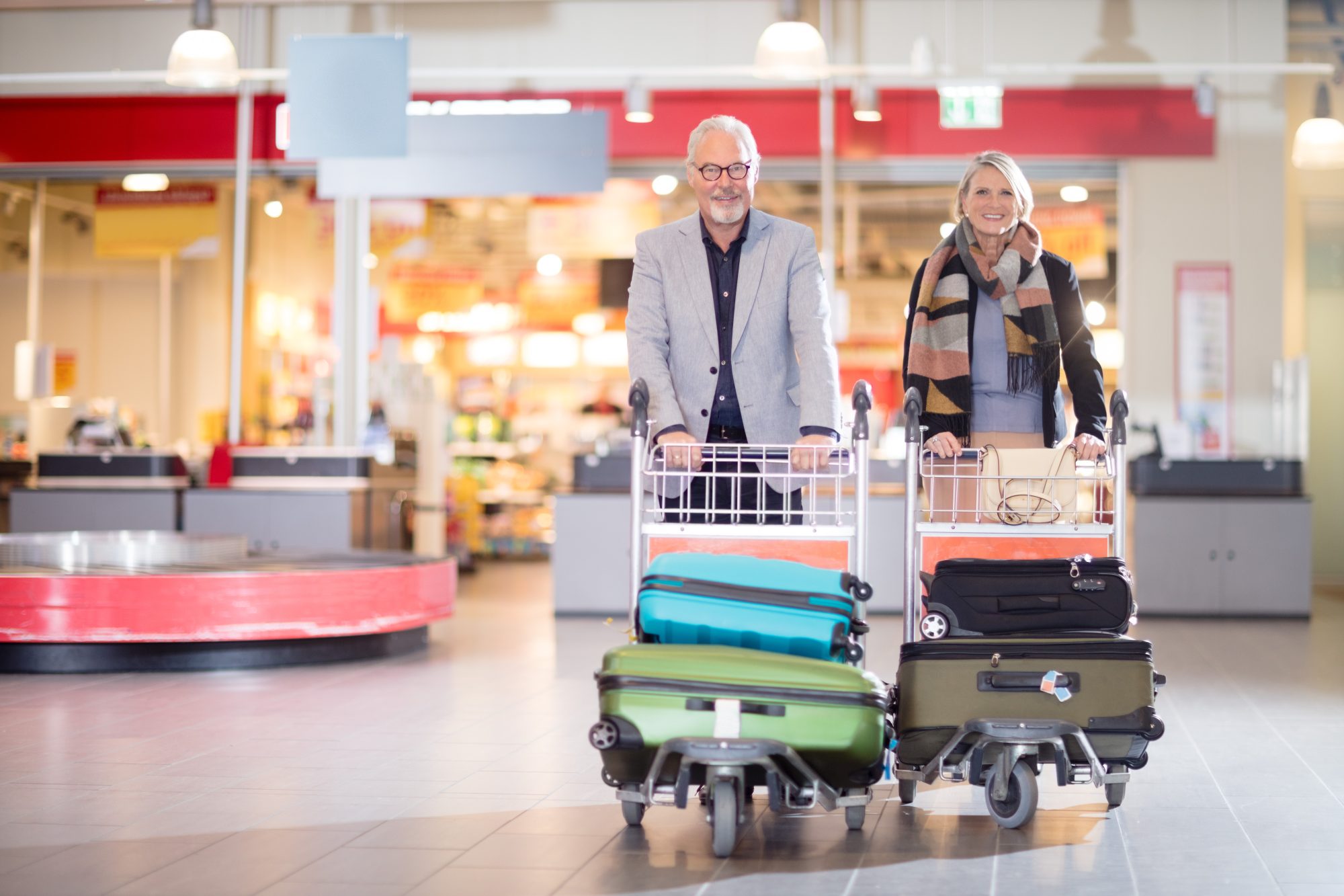 Luggage In Carts At Airport Airport Transfers