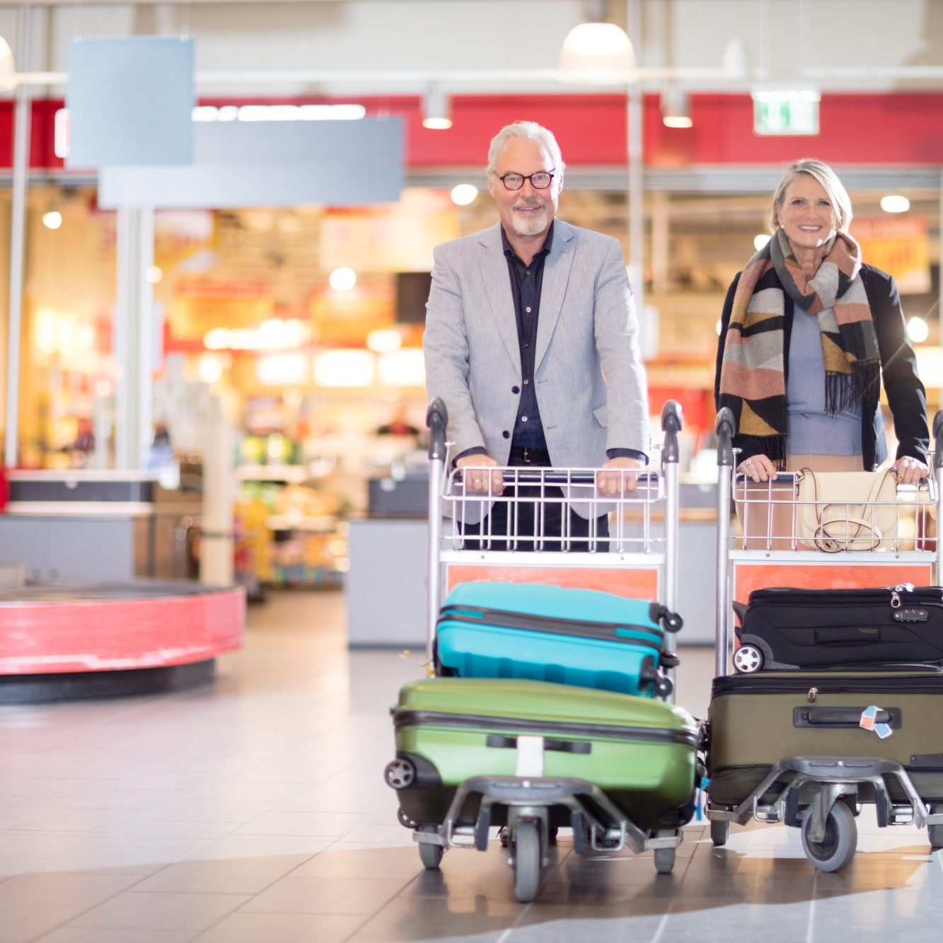 Luggage In Carts At Airport Airport Transfers